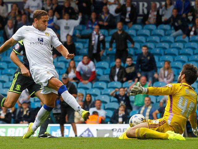 Billy Sharp of Leeds scores his sides first goal during the Sky Bet Championship match between Leeds United and Middlesbrough at Elland Road on August 16, 2014