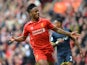 Liverpool's English midfielder Raheem Sterling celebrates scoring the opening goal during the English Premier League football match between Liverpool and Southampton at Anfield stadium in Liverpool, northwest England, on August 17, 2014