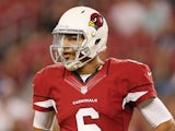 Quarterback Logan Thomas #6 of the Arizona Cardinals walks on the field during the preseason NFL game against the Houston Texans on August 9, 2014
