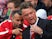 Louis van Gaal and Ryan Giggs discuss tactics during Man United's Premier League opener with Swansea on August 16, 2014