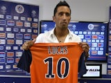 The new player of French L1 football club Montpellier Herault Sport Club (MHSC), Paraguayan forward Lucas Barrios, poses with his new jersey in Montpellier on August 12, 2014