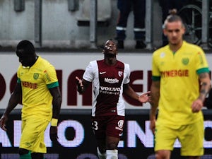 Metz strike twice to steal victory