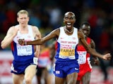 Mo Farah celebrates winning gold in the men's 10,000m, while teammate Andy Vernon takes silver in Zurich on August 13, 2014