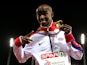 Gold medalist Mo Farah of Great Britain and Northern Ireland poses on the podium during the medal ceremony for the Men's 10,000 metres final during day two of the 22nd European Athletics Championships at Stadium Letzigrund on August 13, 2014
