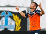 Montpellier's French forward Anthony Mounier celebrates after scoring a goal during the French L1 football match between Olympique de Marseille (OM) and Montpellier (MHSC) on August 17, 2014