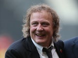MK Dons chairman Pete Winkleman looks on prior to the Pre-Season Friendly match between MK Dons and Leicester City at Stadium mk on August 4, 2014