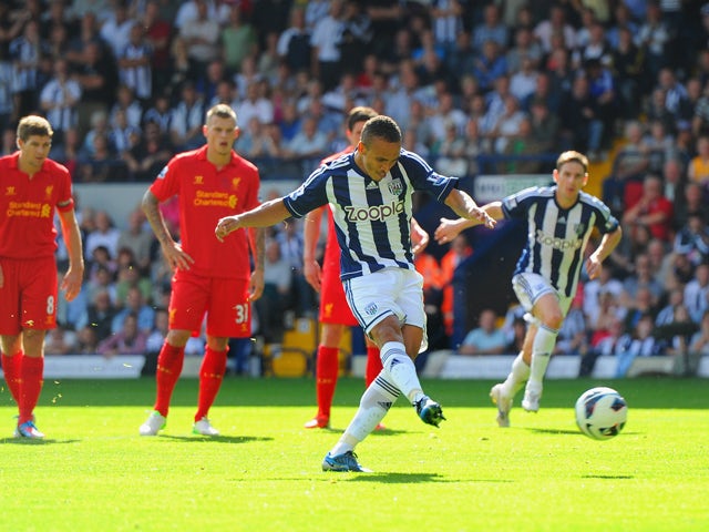 Peter Odemwingie of West Brom scores their second goal from the penalty spot during the Barclays Premier League match between West Bromwich Albion and Liverpool at The Hawthorns on August 18, 2012