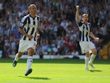 Peter Odemwingie of West Brom celebrates scoring their second goal from the penalty spot during the Barclays Premier League match between West Bromwich Albion and Liverpool at The Hawthorns on August 18, 2012