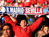 A fan shows his support prior to kickoff during the UEFA Super Cup between Real Madrid and Sevilla FC at Cardiff City Stadium on August 12, 2014