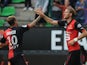 Rennes' Swedish forward Ola Toivonen celebrates with his teammate Rennes' Polish forward Kamil Grosicki after scoring a goal during the French L1 football match between Stade Rennais FC and Evian-Thonon Gaillard FC on August 16, 2014