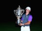 Northern Ireland's Rory McIlroy poses with the Wanamaker Trophy after winning his second US PGA title at Valhalla Golf Club on August 10, 2014