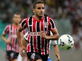 Douglas of Sao Paulo battles for the ball during the match between Bahia and Sao Paulo as part of Brasileirao Series A 2014 at Arena Fonte Nova on July 16, 2014