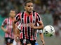 Douglas of Sao Paulo battles for the ball during the match between Bahia and Sao Paulo as part of Brasileirao Series A 2014 at Arena Fonte Nova on July 16, 2014