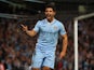 Sergio Aguero of Manchester City celebrates after scoring the second goal during the Barclays Premier League match between Manchester City and Swansea City at Etihad Stadium on August 15, 2011
