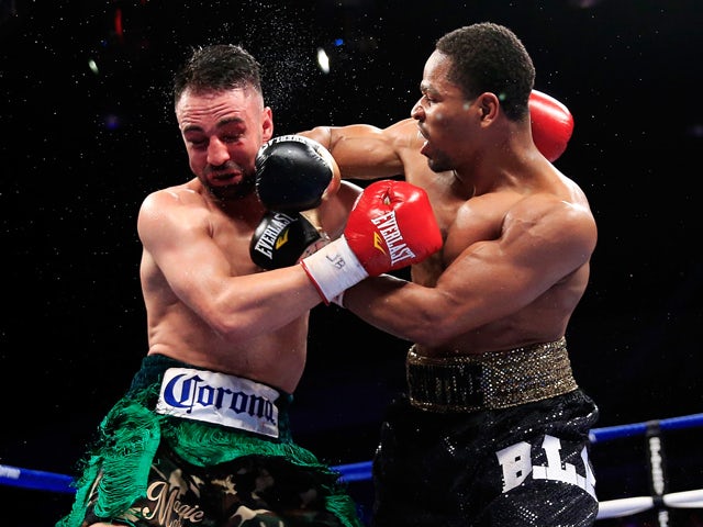 Shawn Porter lands a punch on Paulie Malignaggi during their IFB Welterweight Title fight on April 19, 2014