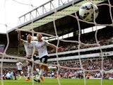 Harry Kane and Eric Dier celebrate the latter's winning goal for Tottenham Hotspur against West Ham United in the Premier League on August 16, 2014