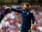 Mauricio Pochettino the Spurs manager directs his players during the Barclays Premier League match between West Ham United and Tottenham Hotspur at Boleyn Ground on August 16, 2014