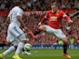 New Man Utd captain Wayne Rooney in action against Swansea on August 16, 2014