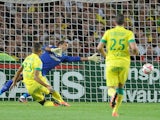 Nantes' French forward Yacine Bammou (L) scores a goal during the French L1 football match Nantes (FCNA) vs Lens (RCL) at the Beaujoire stadium, on August 9, 2014