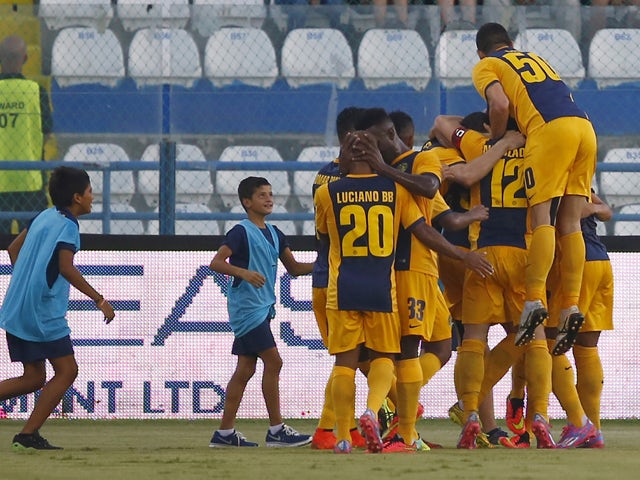 Players from AEL Limassol FC celebrate a goal during the AEL Limassol FC v Tottenham Hotspur - UEFA Europa League Qualifying Play-Off match on August 21, 2014