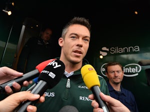 Germany's Andre Lotterer talks to the media in the paddock at the Spa-Francorchamps circuit in Spa on August 22, 2014