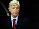 Arsenal's manager Arsene Wenger waits for the begining of the UEFA Champions League play-off football match Besiktas vs Arsenal at Ataturk Olympic Stadium on August 19, 2014
