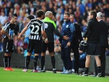 Assistant Manager of Aston Villa Roy Keane exchanges words with Daryl Janmaat of Newcastle United during the Barclays Premier League match between Aston Villa and Newcastle United at Villa Park on August 23, 2014