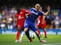 Jeffrey Schlupp of Leicester City battles with Andre Schurrle of Chelsea during the Barclays Premier League match between Chelsea and Leicester City at Stamford Bridge on August 23, 2014
