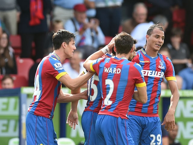 Maourane Chamakh of Crystal Palace celebrates his goal with teammates during the Premiere League match between Crystal Palace and West Ham United at Selhurst Park on August 23, 2014