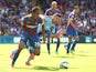 Marouane Chamakh of Crystal Palace and Mauro Zarate of West Ham in action during the Premiere League match between Crystal Palace and West Ham United at Selhurst Park on August 23, 2014