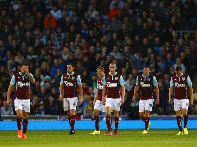 Danny Ings, Michael Duff, David Jones, Lukas Jutkiewicz and Dean Marney of Burnley look deejcted after conceding a third goal during the Barclays Premier League match against Chelsea on August 18, 2014
