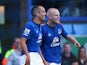 Steven Naismith of Everton celebrates scoring the second goal with team mate Leon Osman during the Barclays Premier League match between Everton and Arsenal at Goodison Park on August 23, 2014