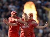 Andrew Flintoff of Lancashire celebrates with Ashwell Prince and Paul Horton after dismissing Ian Bell of Birmingham Bears during the Natwest T20 Blast final between Lancashire Lighting and Birmingham Bears at Edgbaston on August 23, 2014