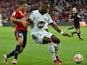 Lorient's French Ivorian defender Lamine Kone vies with Lille's Portuguese midfielder Marco Lopes during the French L1 football match Lille (LOSC) vs Lorient (FCL) on August 23, 2014
