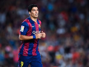 Suarez hopes to tame biting "impulse"