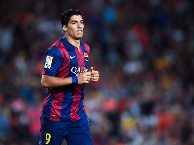 Luis Suarez of FC Barcelona looks on during the Joan Gamper Trophy match between FC Barcelona and Club Leon at Camp Nou on August 18, 2014