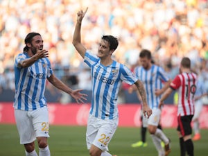 Malaga come from behind to beat Elche