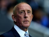 Huddersfield manager Mark Lillis looks on prior to the Sky Bet Championship match between Reading and Huddersfield Town at Madejski Stadium on August 19, 2014