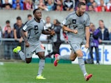 Marseille's French forward Andre-Pierre Gignac celebrates after scoring a goal during the French L1 football match Guingamp vs Marseille on August 23, 2014
