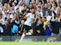 Spurs fans celebrate the opening goal by Nacer Chadli of Spurs during the Barclays Premier League match against QPR on August 24, 2014