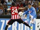 Napoli's Spanish forward Jose Maria Callejon vies with Bilbao's Spanish defender Mikel Balenziaga during the first leg of the UEFA Champions League play-off football match between SSC Napoli and Bilbao Athletic Club in San Paolo Stadium on August 19, 2014
