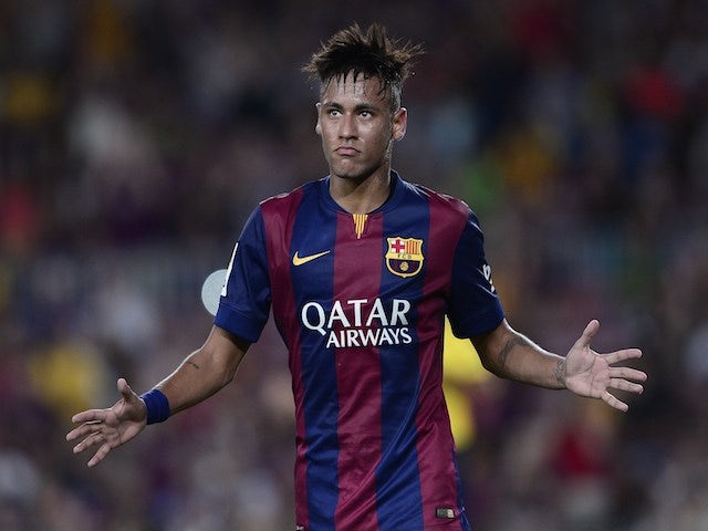 Barcelona's Brazilian forward Neymar celebrates his goal during the 49th Joan Gamper Trophy football match FC Barcelona vs Leon Club on August 18, 2014