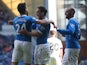 Darren McGregor celebrates with team mates Nicky Clark and Kris Boyd after he scores during the Scottish Championship League Match between Rangers and Dumbarton, at Ibrox Stadium on August 23, 2014