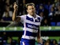 Simon Cox of Reading celebrates after scoring his team's first goal of the game during the Sky Bet Championship match between Reading and Huddersfield Town at Madejski Stadium on August 19, 2014