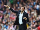 Manager Gustavo Poyet of Sunderland gives instructions during the Barclays Premier League match between Sunderland and Manchester United at Stadium of Light on August 24, 2014