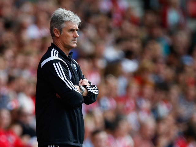 Manager Alan Irvine of West Brom looks on during the Barclays Premier League match between Southampton and West Bromwich Albion at St Mary's Stadium on August 23, 2014