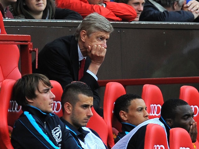 Arsenal's French manager Arsene Wenger looks on during the English Premier League football match against Manchester United on August 28, 2011