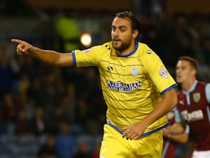 Atdhe Nuhiu of Sheffield Wednesday runs away to celebrate after scoring his teams first goal from the penalty spot during the Capital One Cup Second Round match on August 26, 2014