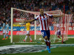 Atletico fight back to lead