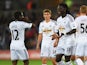 Swansea's Nathan Dyer and Bafetimbi Gomis celebrate during the Capital One Cup Second Round match against Rotherham on August 26, 2014